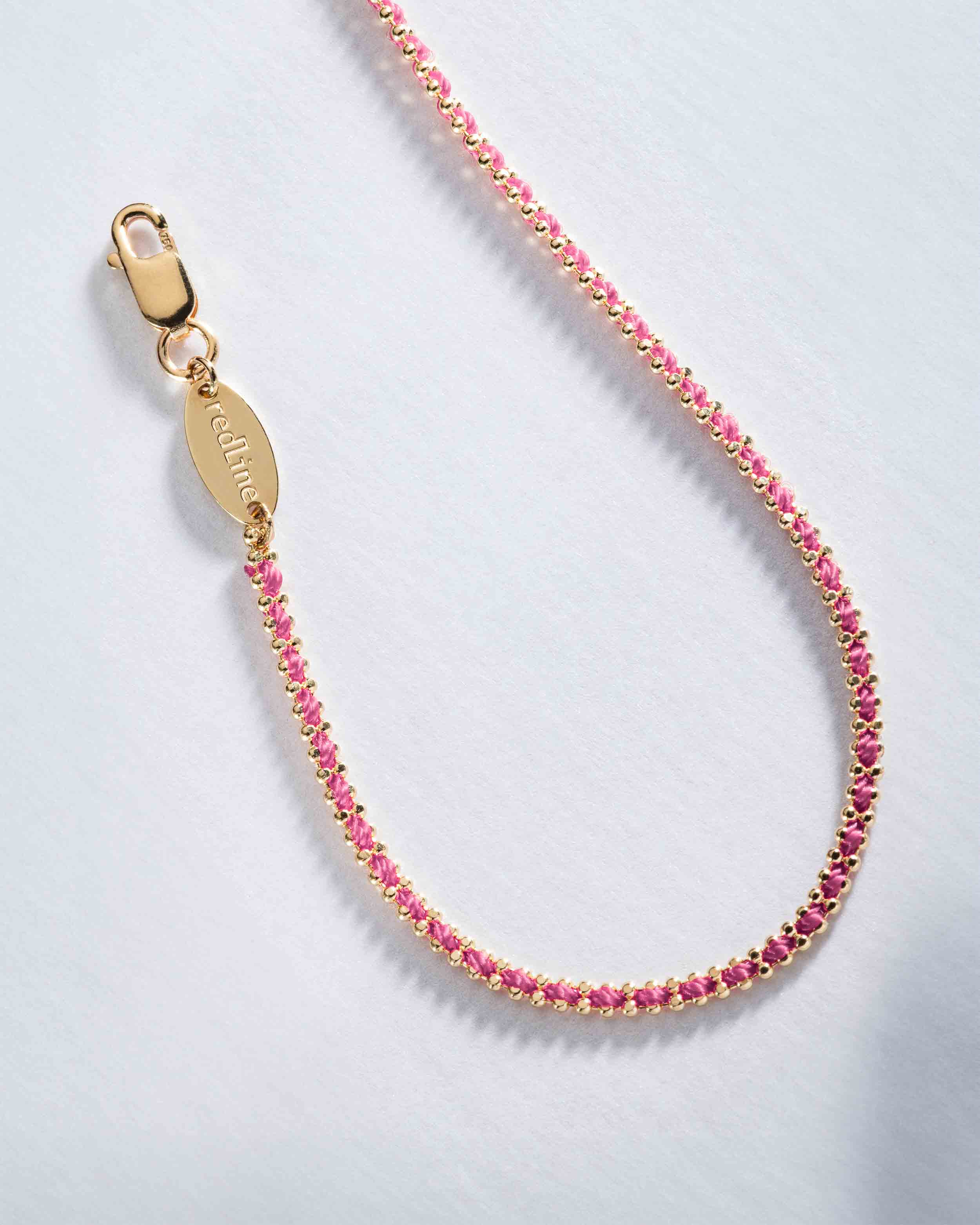 bracelet redline fil rose et chaîne or jaune 